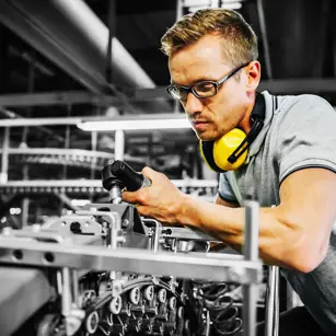 Mechanic working on machine 