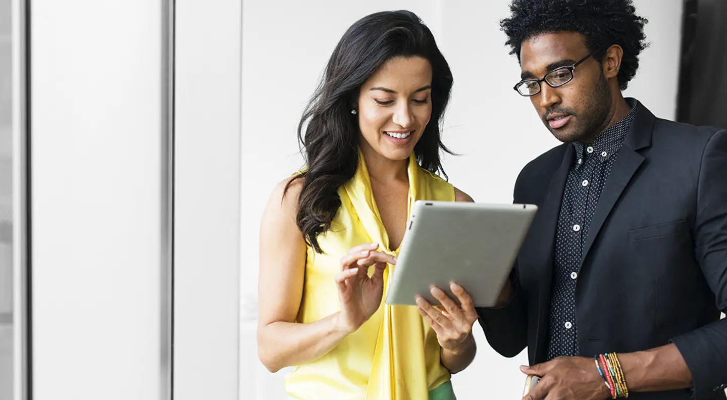 People looking at ipad