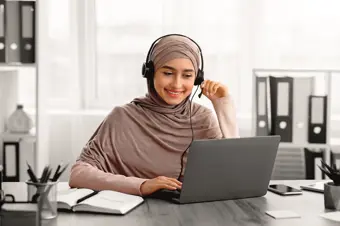 Smiling person on work call