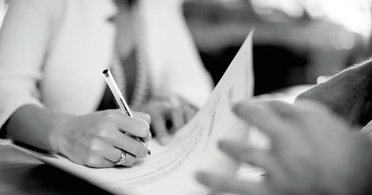 Person signing contract