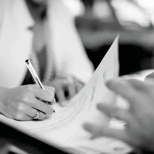 Person signing contract