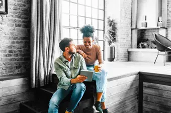 Couple looking at an ipad