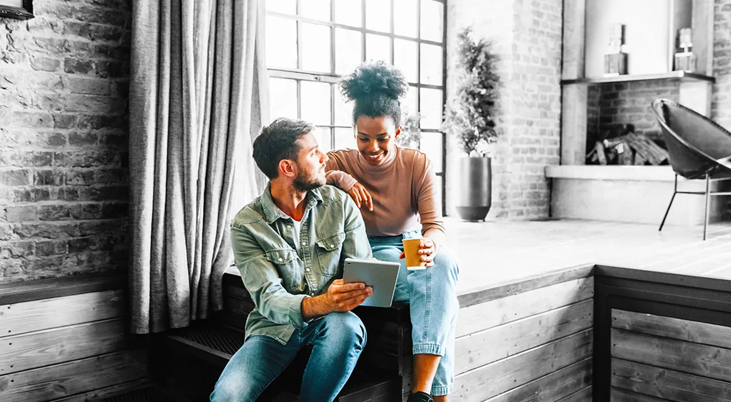 Couple looking at an ipad