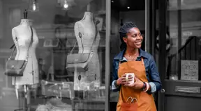 Business owner outside shop 