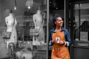 Business owner outside shop 