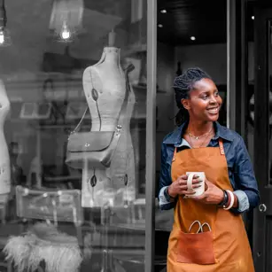 Business owner outside shop 