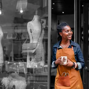 Business owner outside shop