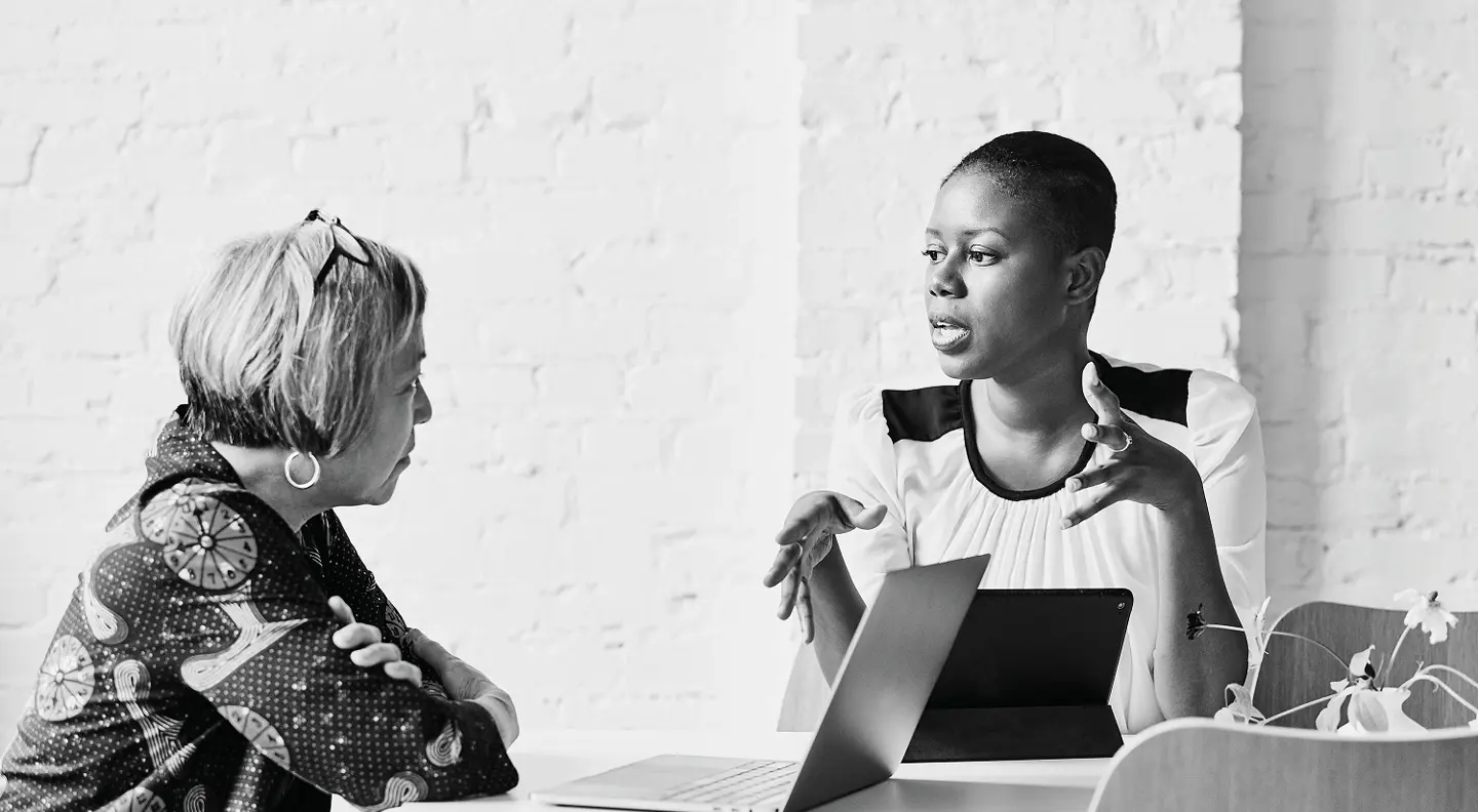 Office meeting at desk