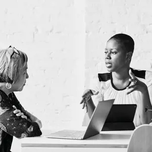 Office meeting at desk