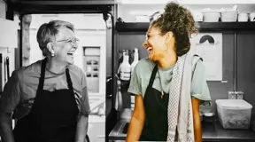 Restaurant workers laughing