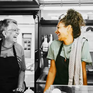 Restaurant workers laughing