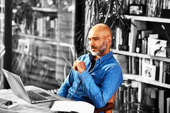 Person looking at laptop