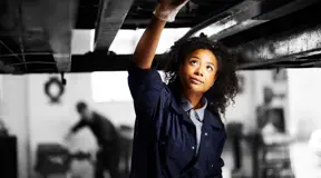 Car mechanic working on car 