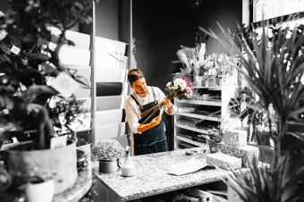 Florist preparing a bouquet