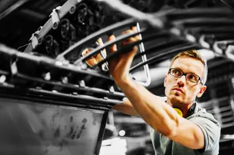 Manufacturer at machine 