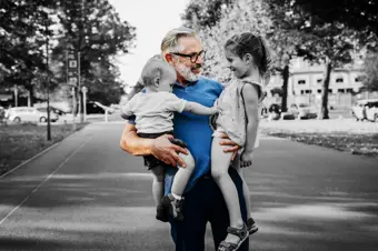 Grandparent holding grand kids
