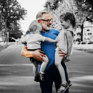 Grandparent holding grand kids