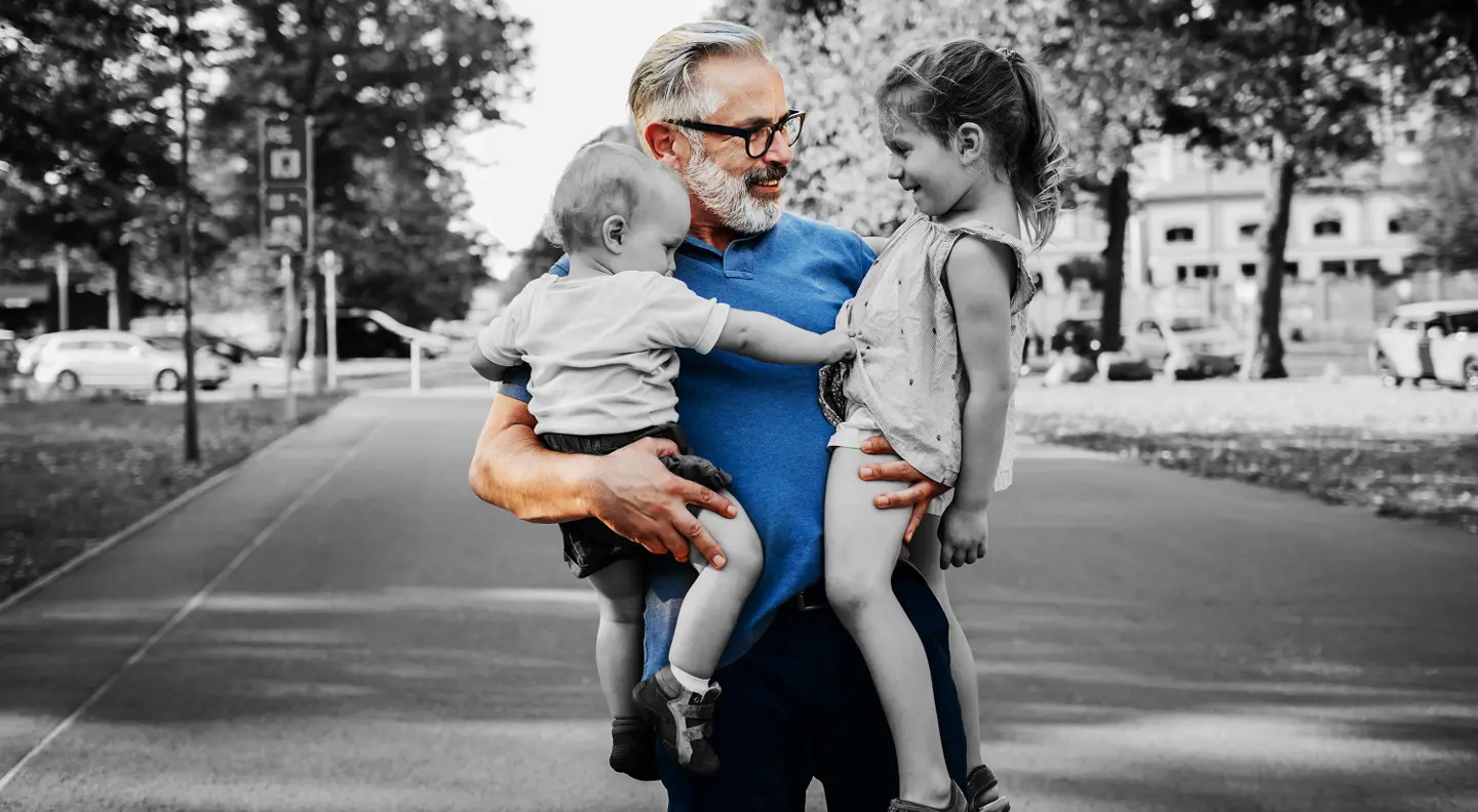 Grandparent holding grand kids