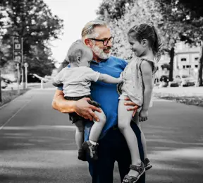Grandparent holding grand kids