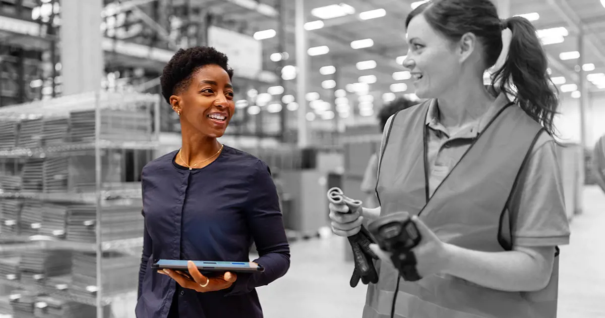 Two people in a factory