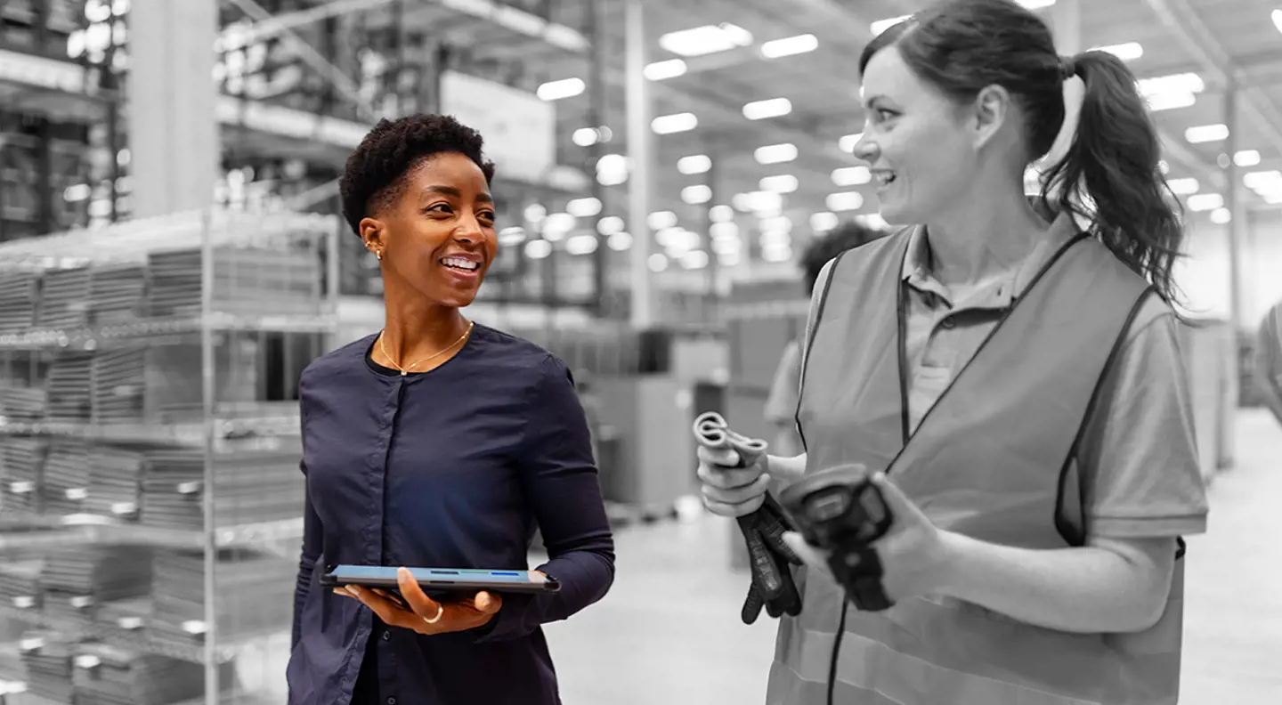 Two people in a factory