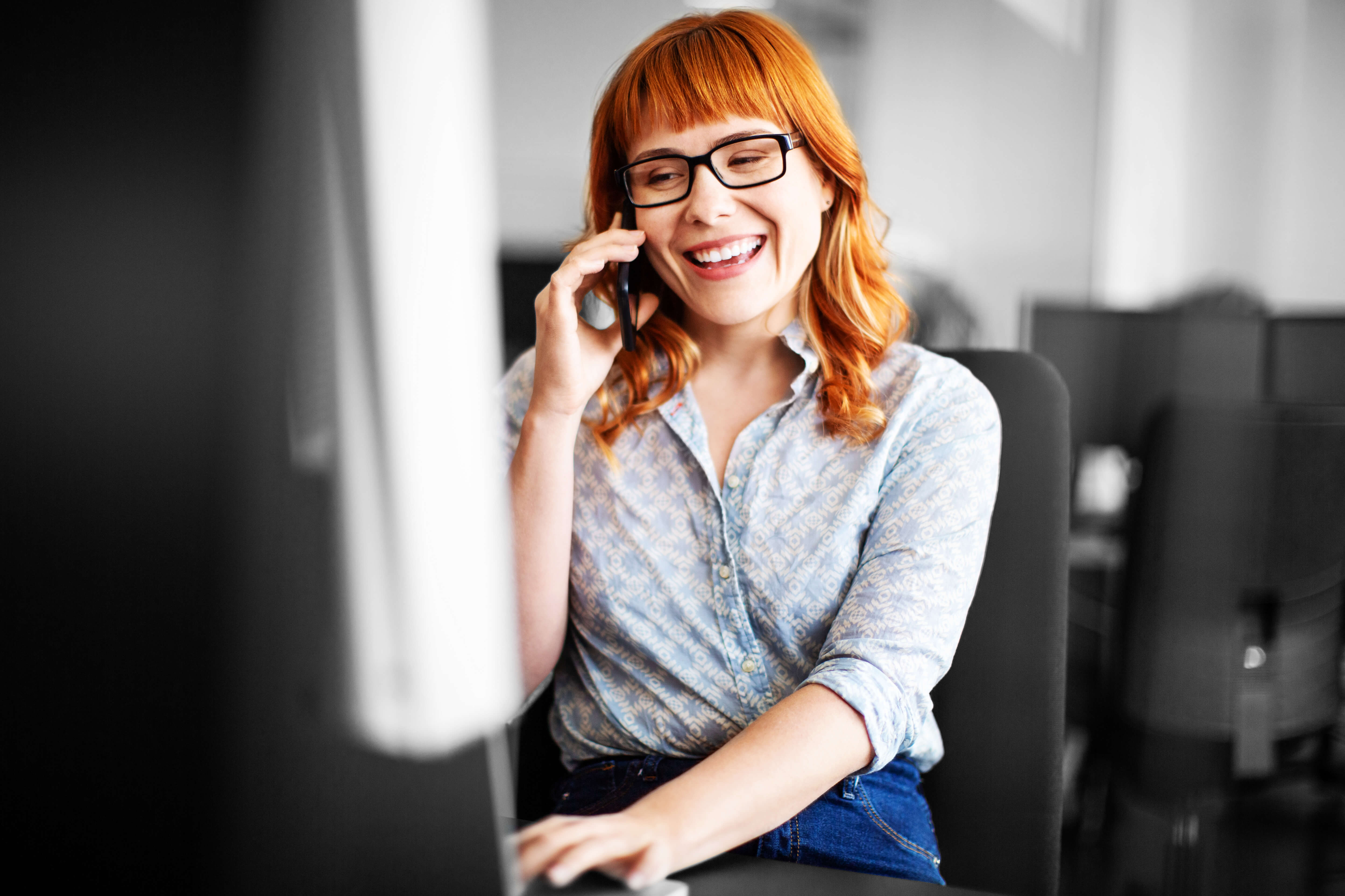 Call centre staff talking to a customer