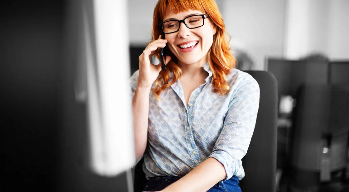 Female broker on the phone