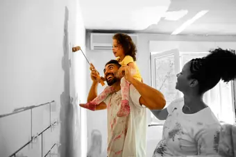 Family decorating new home