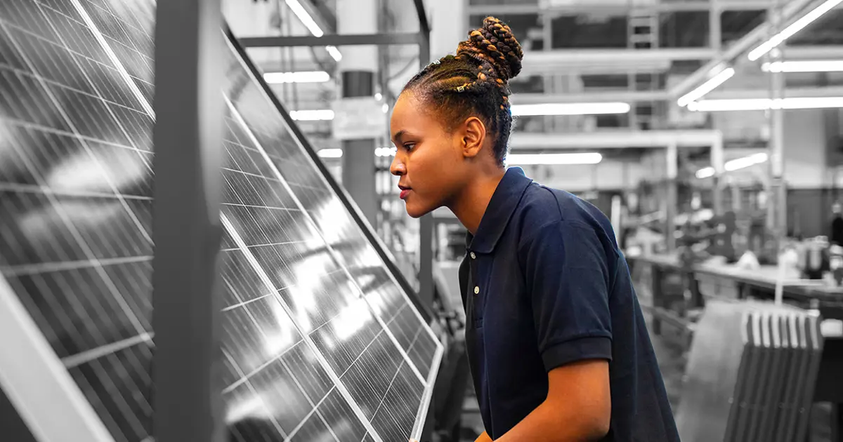Person making solar panels