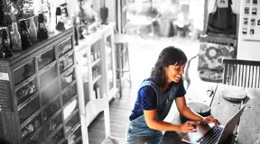 Small business owner on laptop