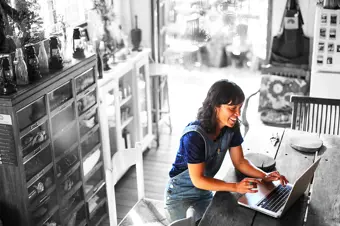 Small business owner on laptop