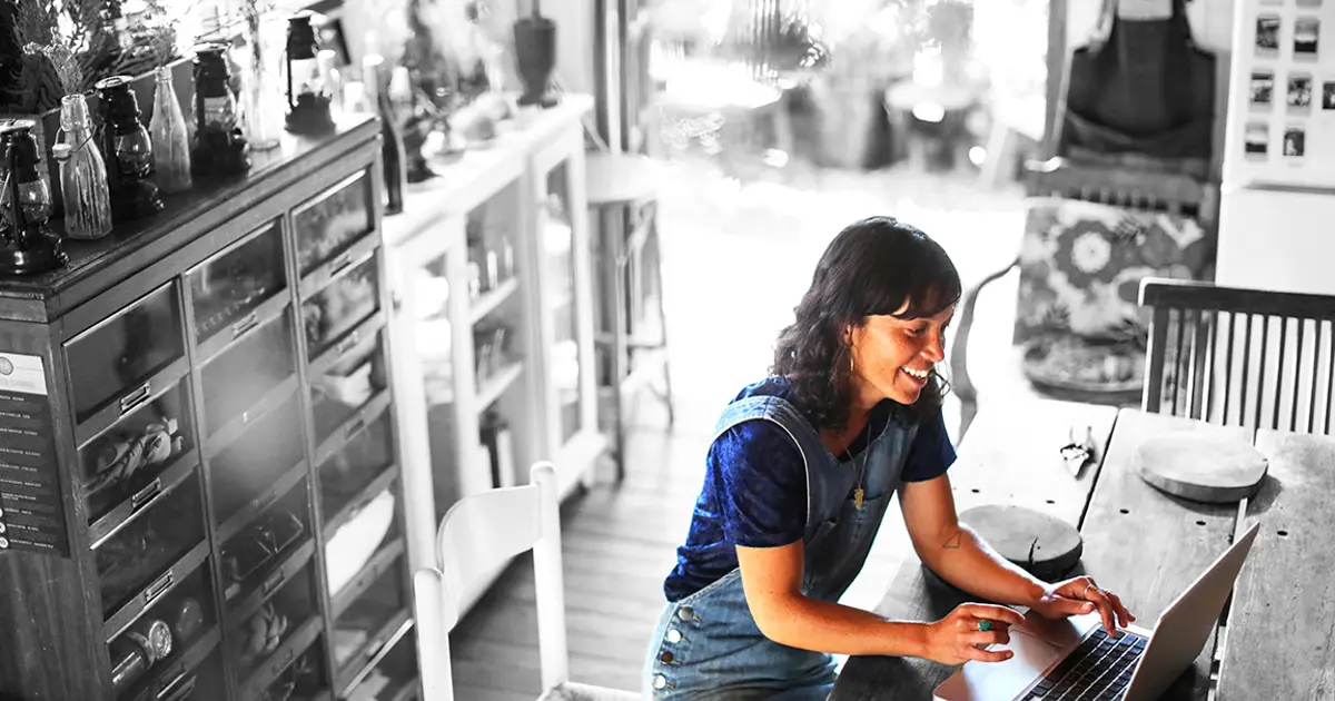 Small business owner on laptop